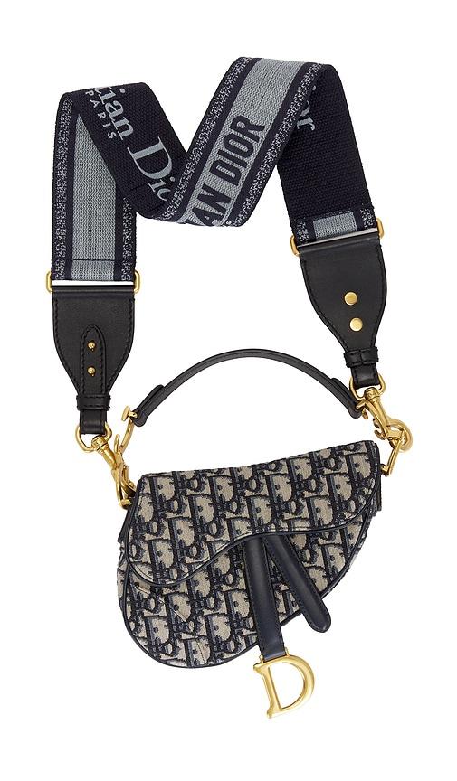 fwrd renew dior oblique mini saddle bag in blue.
