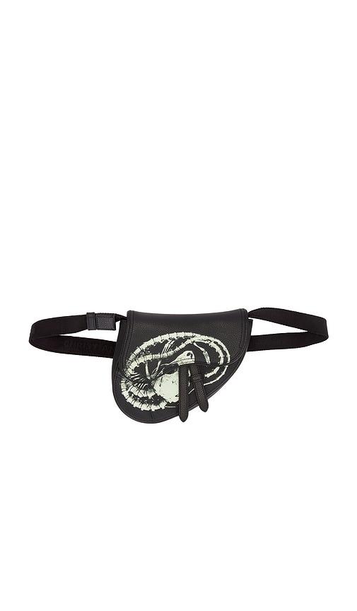 fwrd renew dior x cactus jack mini saddle bag in black.