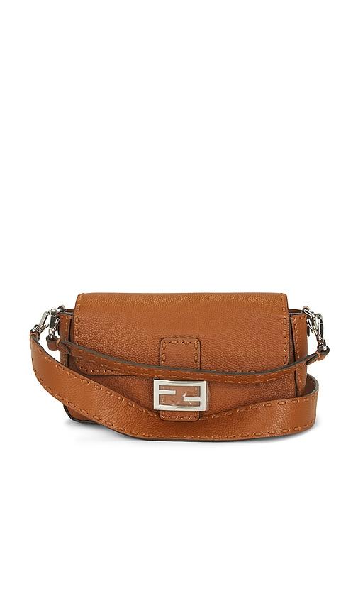 fwrd renew fendi baguette shoulder bag in brown.