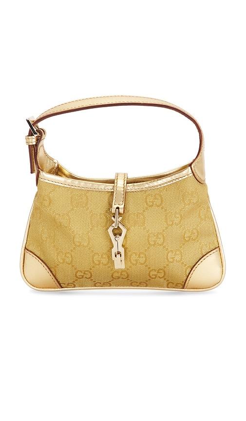 fwrd renew gucci mini jackie hobo bag in metallic gold.