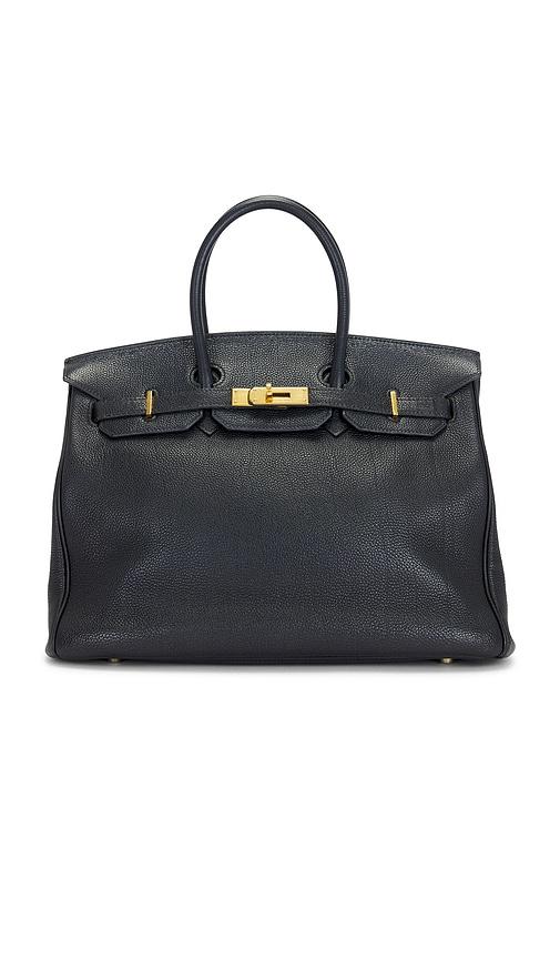 fwrd renew hermes togo birkin 35 retourne handbag in black.