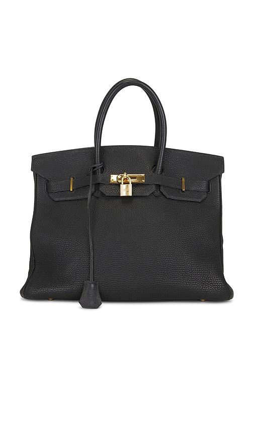 fwrd renew hermes togo birkin 35 retourne handbag in black.