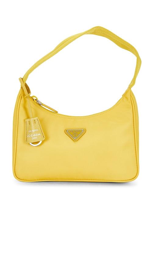 fwrd renew prada re-edition 2000 re-nylon shoulder bag in yellow.