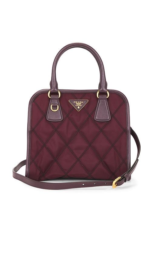 fwrd renew prada tessuto quilted nylon handbag in burgundy.
