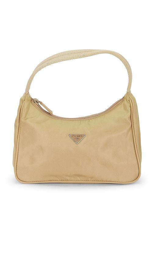 fwrd renew prada tessuto sport hobo bag in beige.