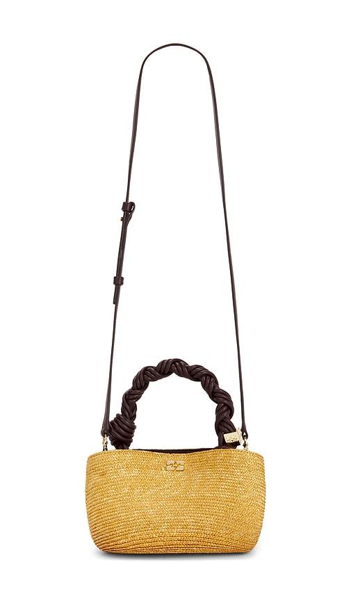 ganni bou mini straw bag in tan.