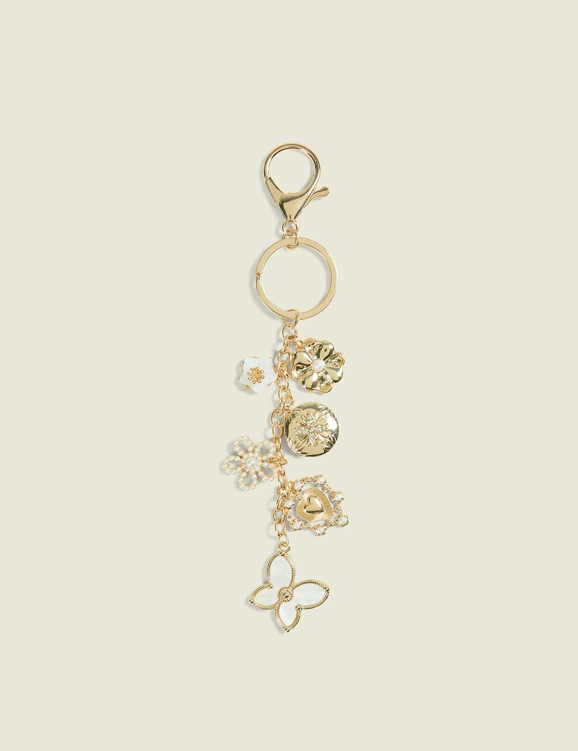 goldtone & pearlized floral bag charm