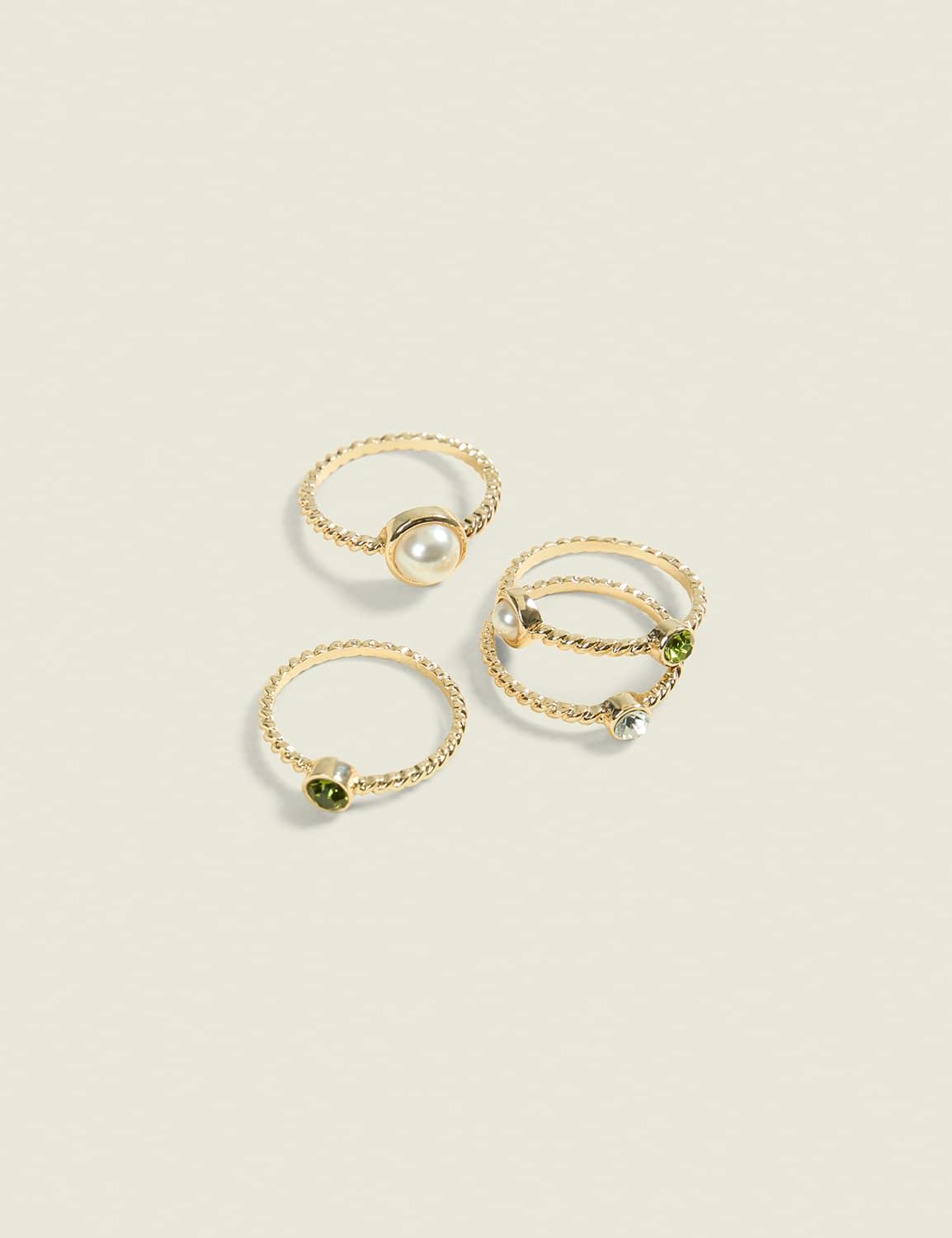 green & pearlized textured ring stack