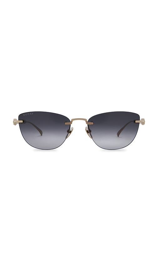 gucci cat eye sunglasses in gold & grey.