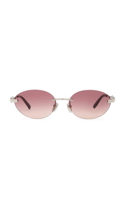 gucci oval sunglasses in metallic silver.