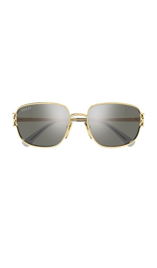 gucci rectangular sunglasses in metallic gold.