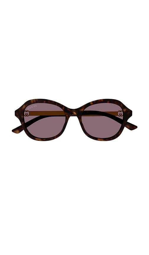 gucci round sunglasses in purple.