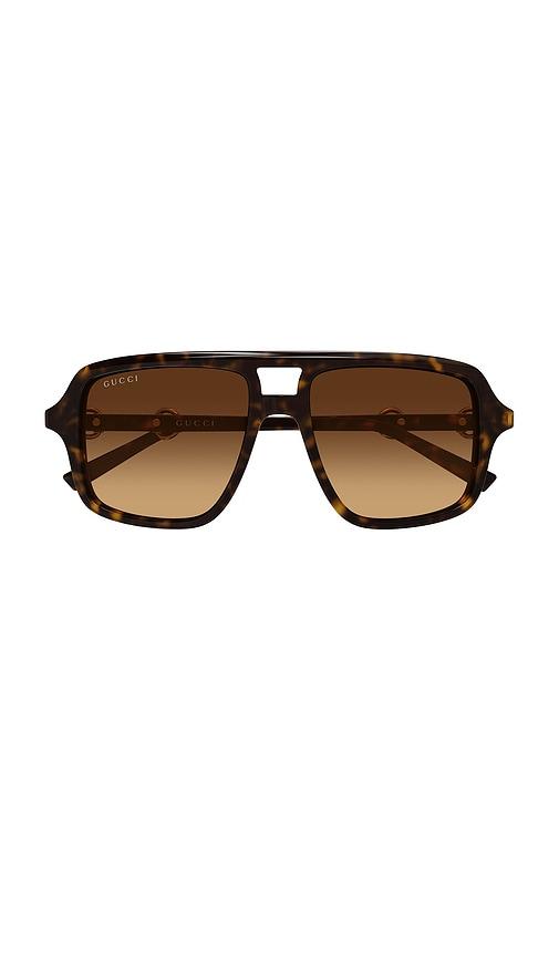 gucci shield sunglasses in brown.