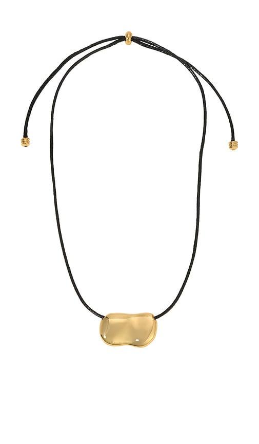 heaven mayhem pebble necklace in metallic gold.