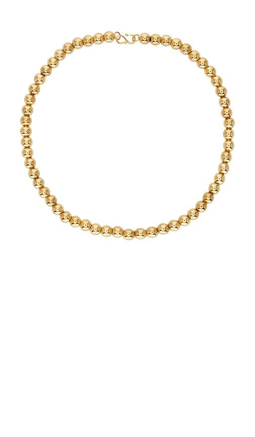 heaven mayhem sol necklace in metallic gold.