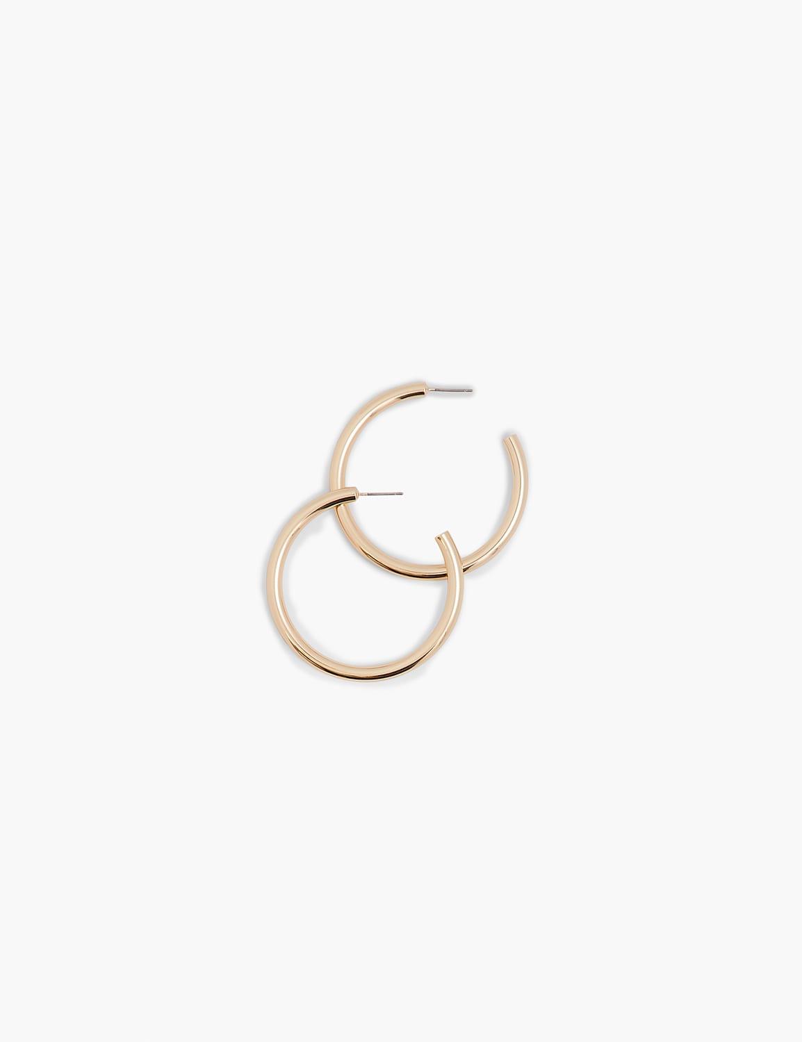 hoop earrings layered in real gold or silver