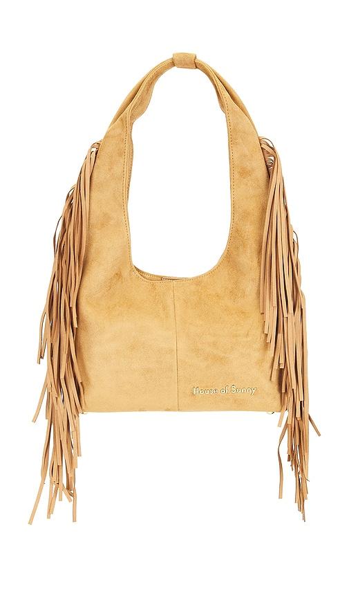 house of sunny tassel sling in tan.