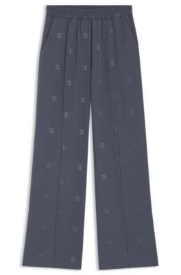hugo relaxed-fit trousers with stacked logos - patterned women's casual pants size 4