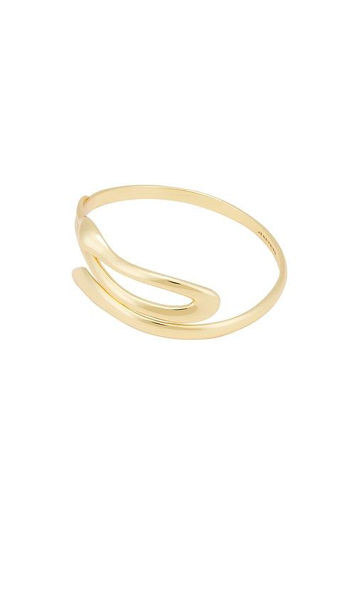 jenny bird egret upper arm cuff in metallic gold.