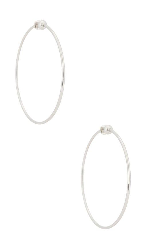 jenny bird icon large hoop earrings in metallic silver.