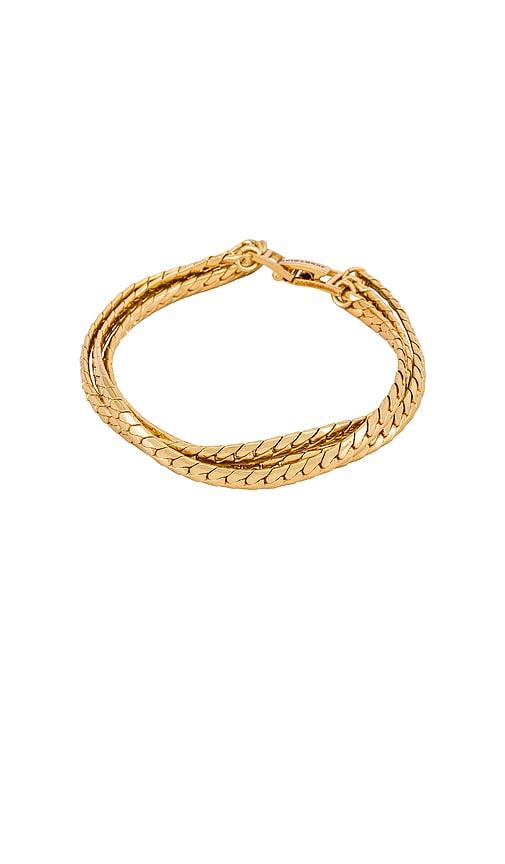 jenny bird priya layered bracelet in metallic gold.