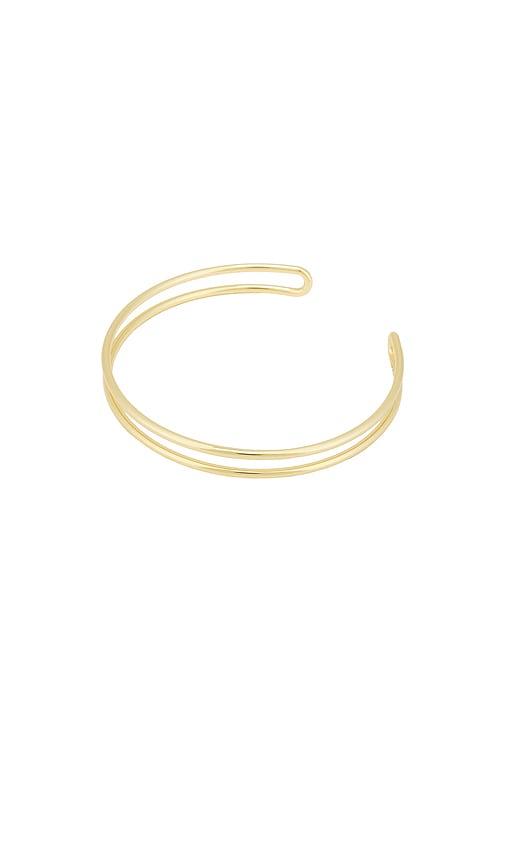 jenny bird yaya arm cuff in metallic gold.