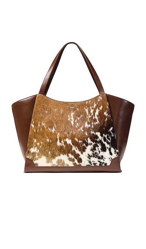 july juliette open winged cow print tote in brown.