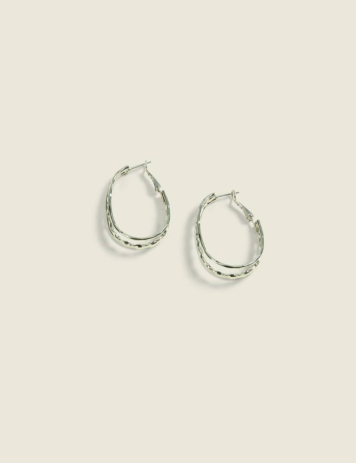 layered silvertone oval hoop earrings