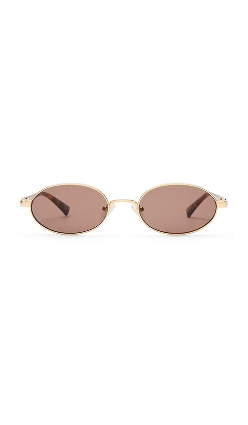 le specs icicle sunglasses in metallic gold.