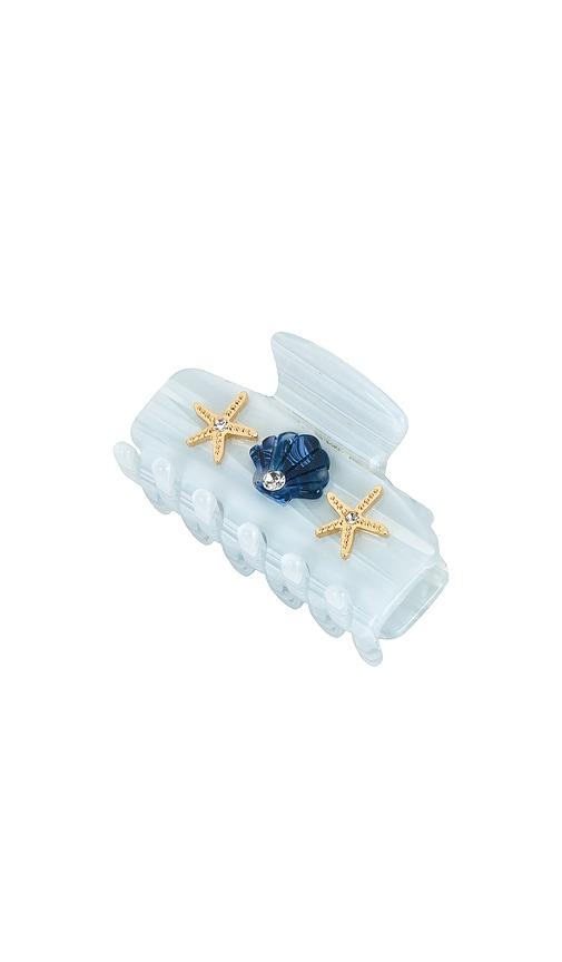 lele sadoughi mini sea shell claw clip in baby blue.