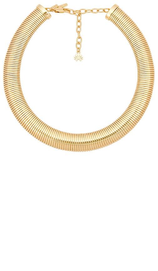 lele sadoughi snake chain necklace in metallic gold.