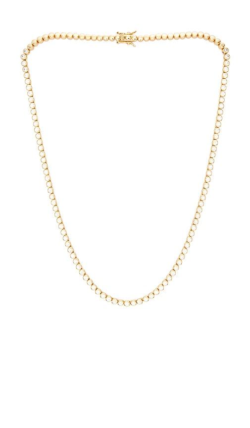 lili claspe mini reese tennis necklace in metallic gold.