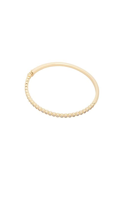 lili claspe reese bangle in metallic gold.