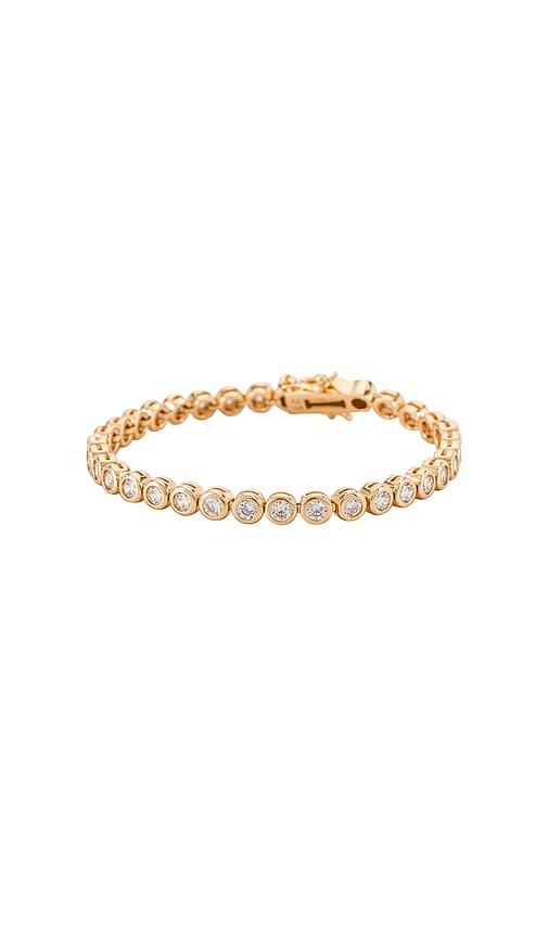lili claspe reese tennis bracelet in metallic gold.