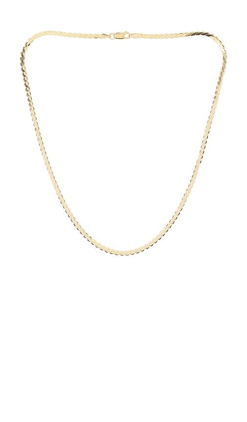 loren stewart serpentine chain necklace in metallic gold.