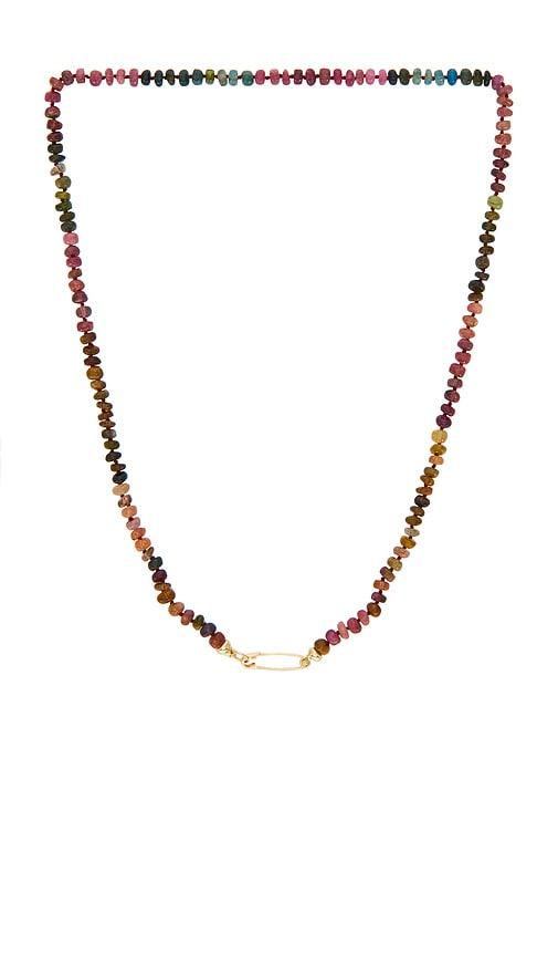 loren stewart tourmaline safety pin necklace in metallic gold.