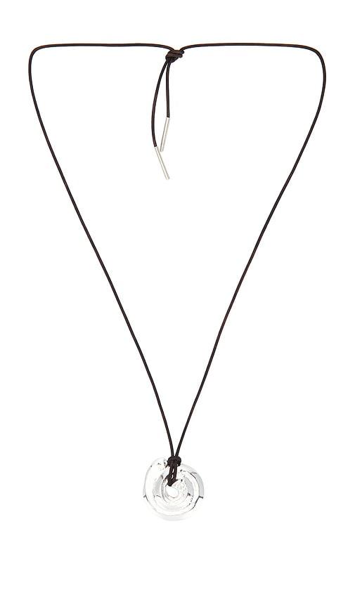 loren stewart tumbled shell on cord in brown.