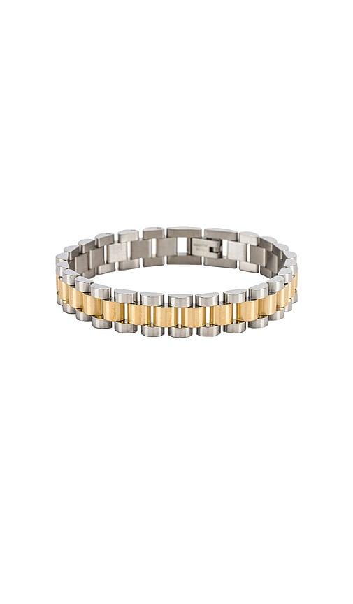 luv aj the two-toned timepiece bracelet in metallic gold.
