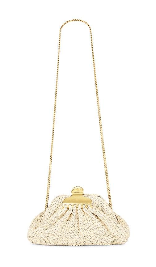 marc jacobs the small claw clip clutch in neutral.