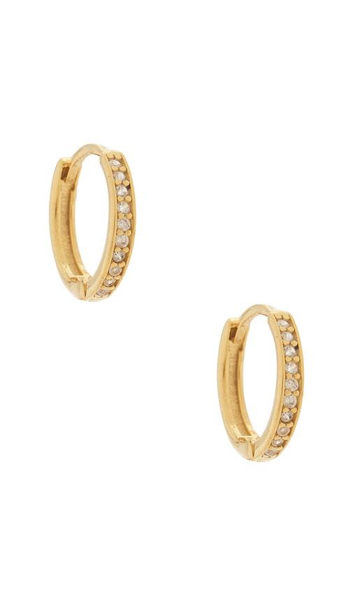 mazin jewels micro icon huggies earrings in metallic gold.