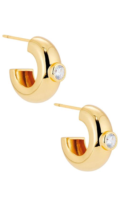 mega large cz donut earring in metallic gold.