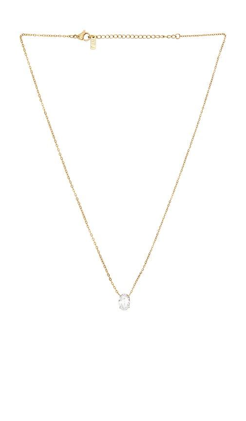 natalie b jewelry evan solitaire necklace in metallic gold.