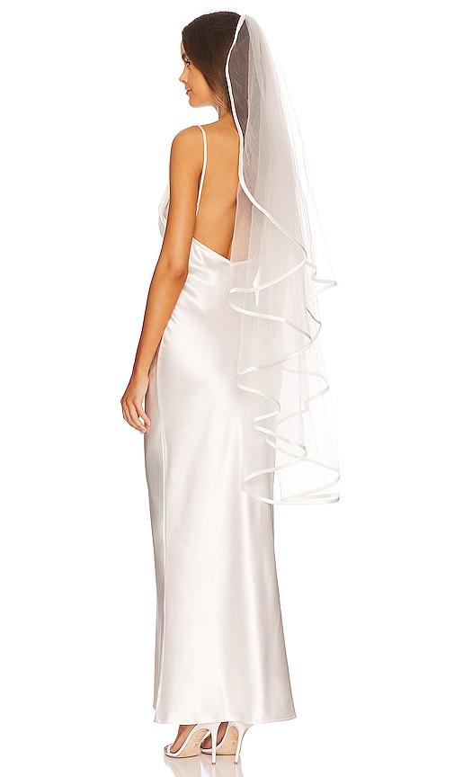ofrenda studio boline satin trim veil in ivory.