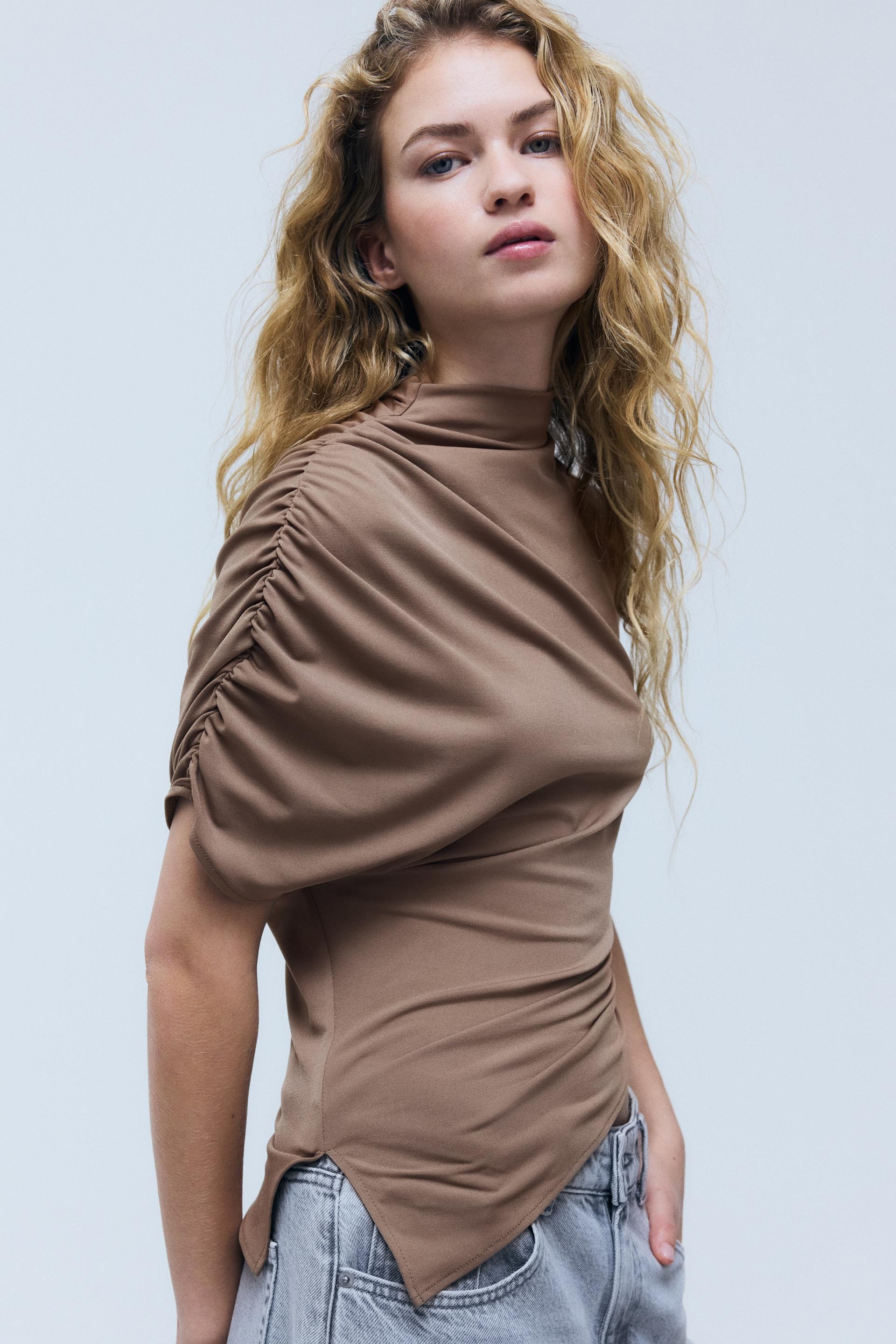 one-sleeve mock turtleneck top