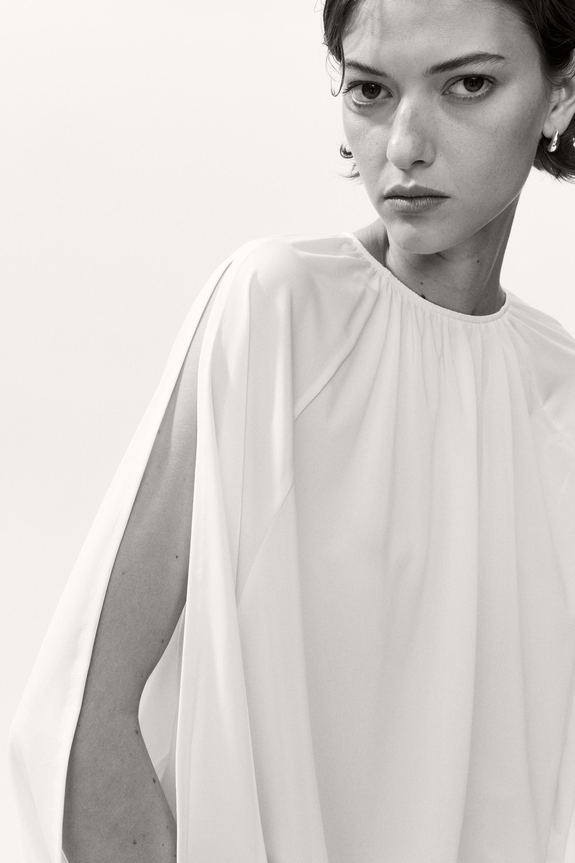 open-sleeve top