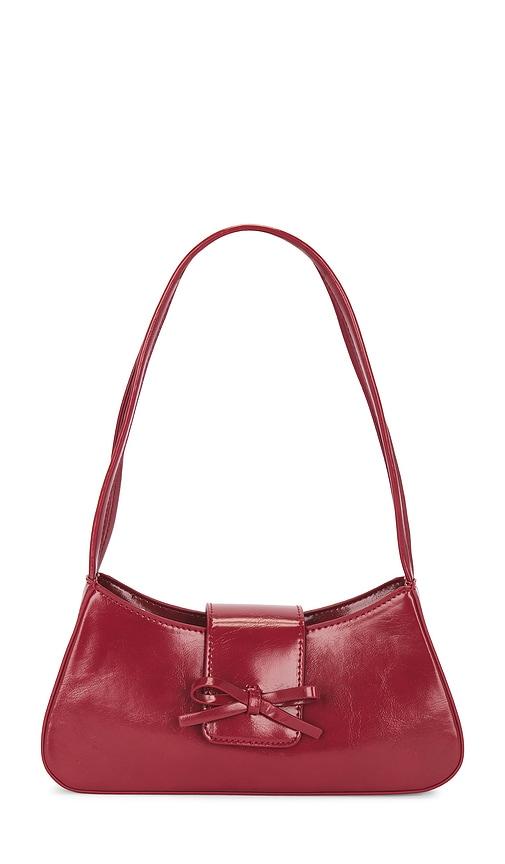 petit moments bow bag in red.