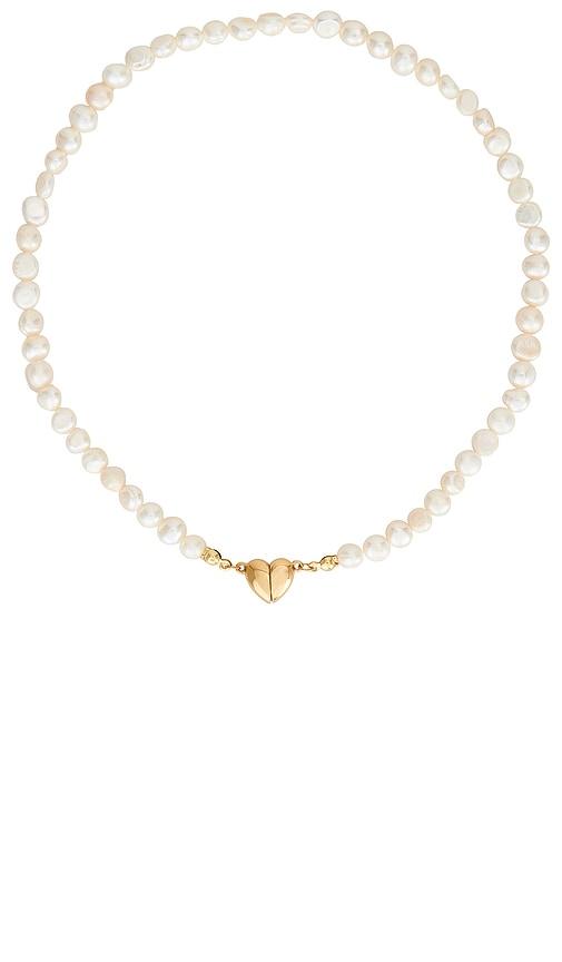 petit moments celeste necklace in ivory.
