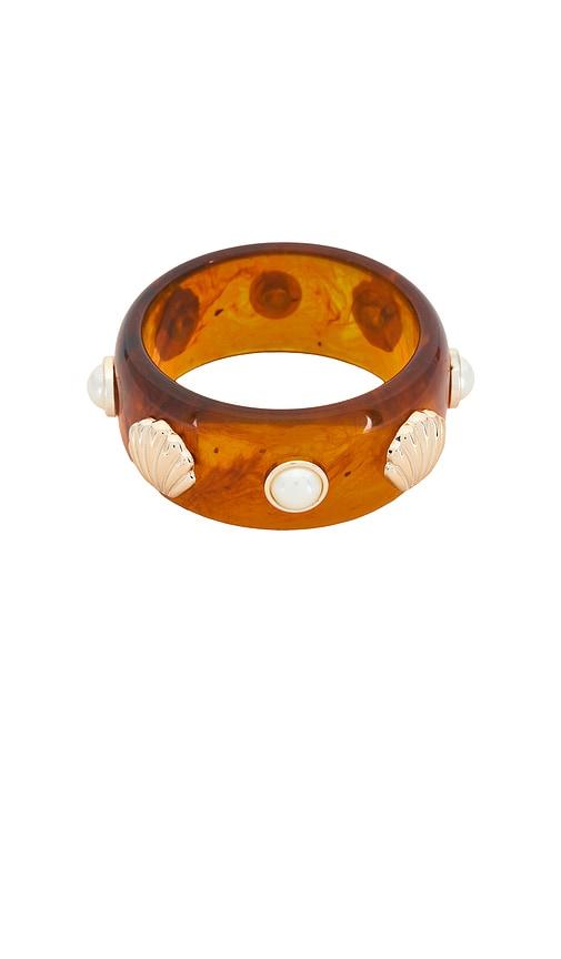 petit moments detailed resin cuff in cognac.
