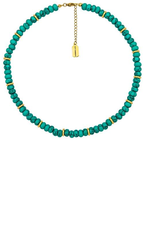 petit moments elfie necklace in teal.