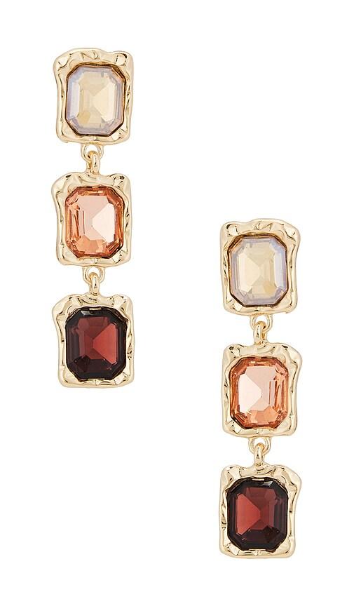 petit moments glow earrings in brown.
